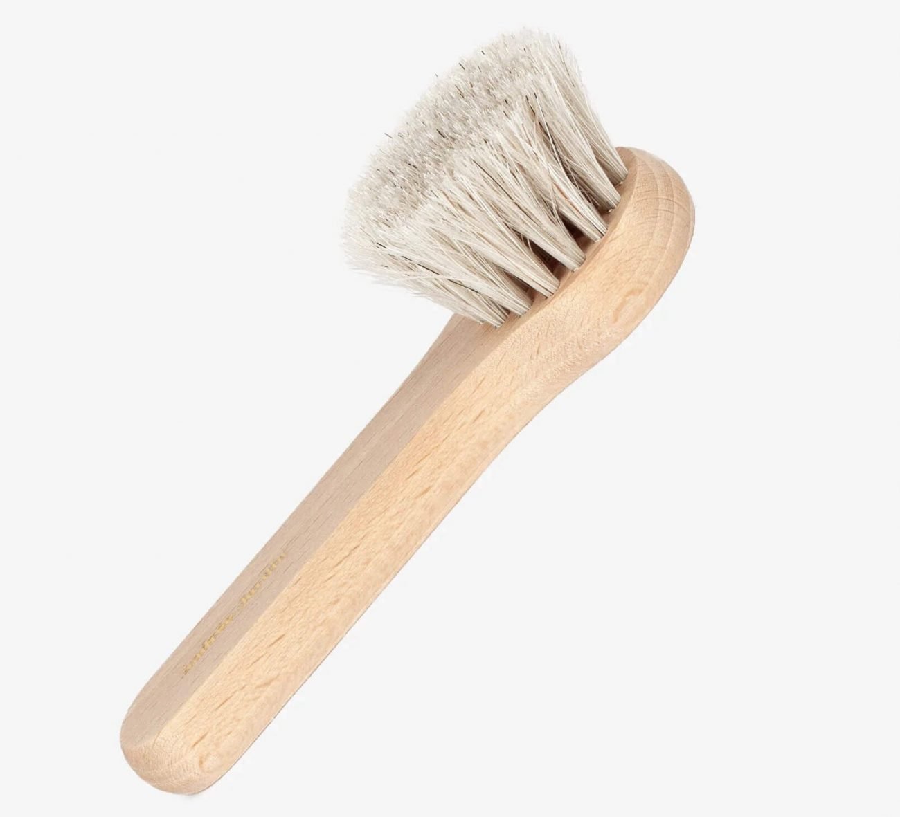 Soft fiber brush used to clean leather bracelets