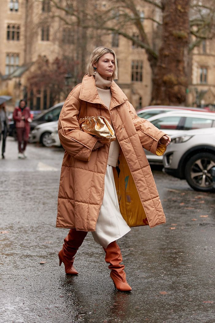 thigh-high boots and puffer jacket