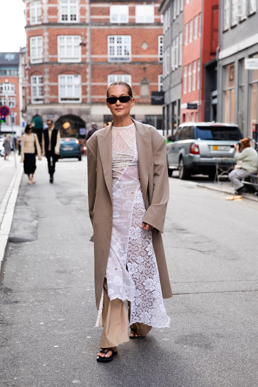 woman wearing a layered outfit at Copenhagen fashion week