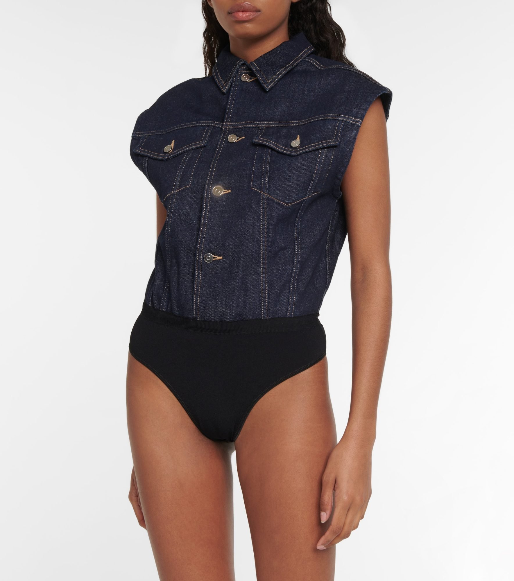 Trendy denim bodysuit by Alaïa: closeup