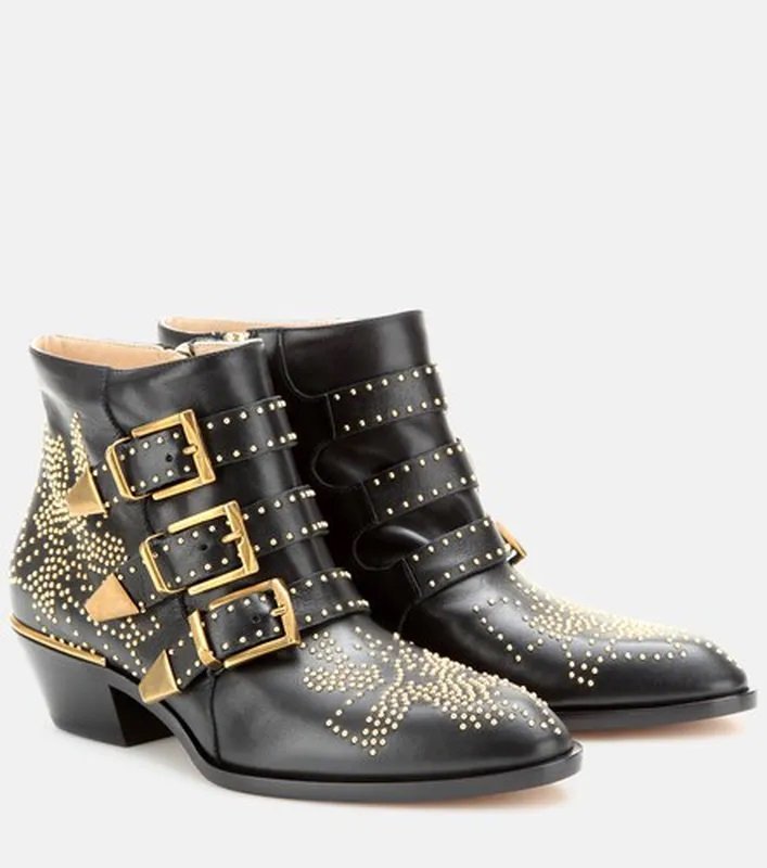 Black boots with gold studs