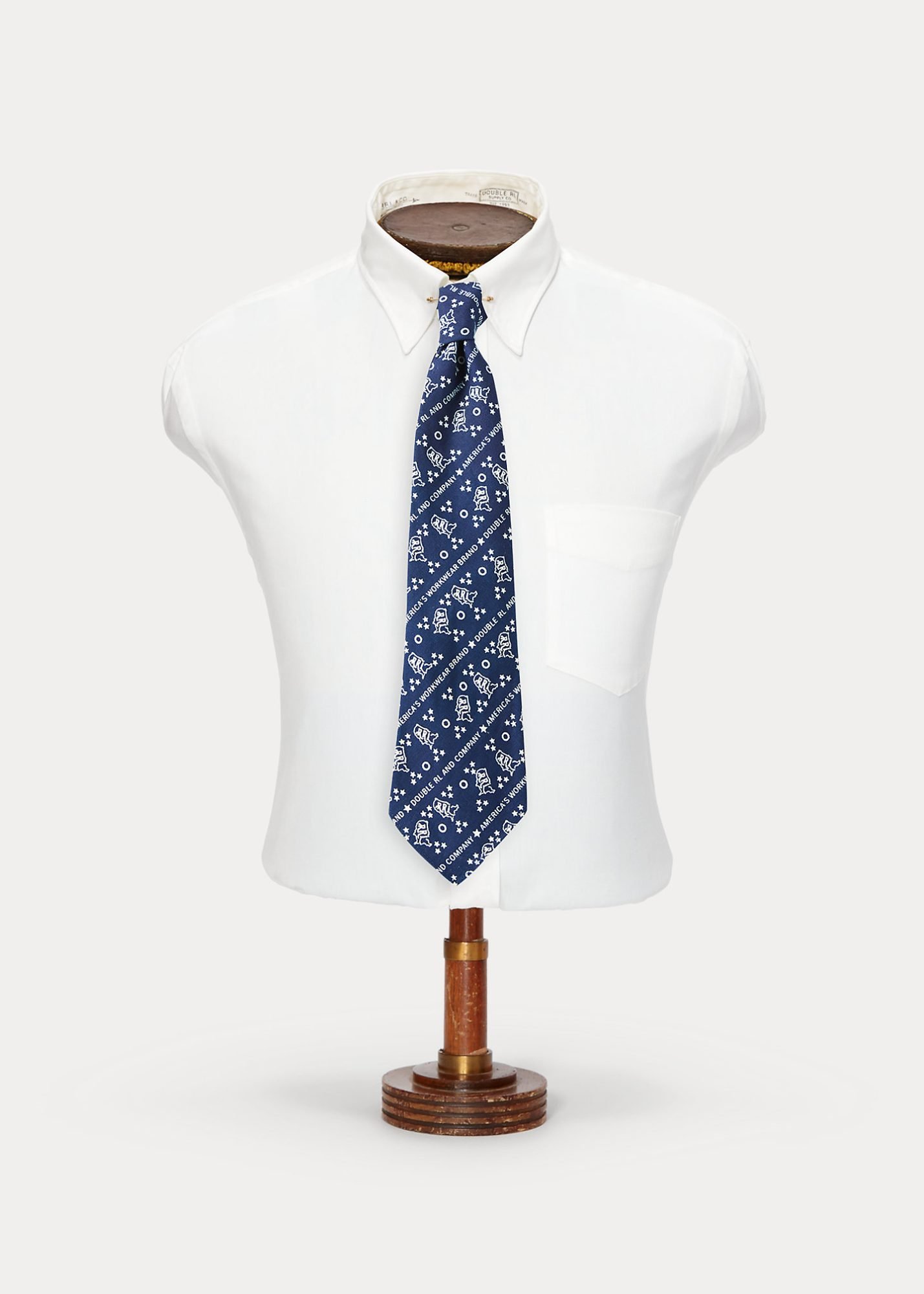 Blue and white patterned tie by Ralph Lauren