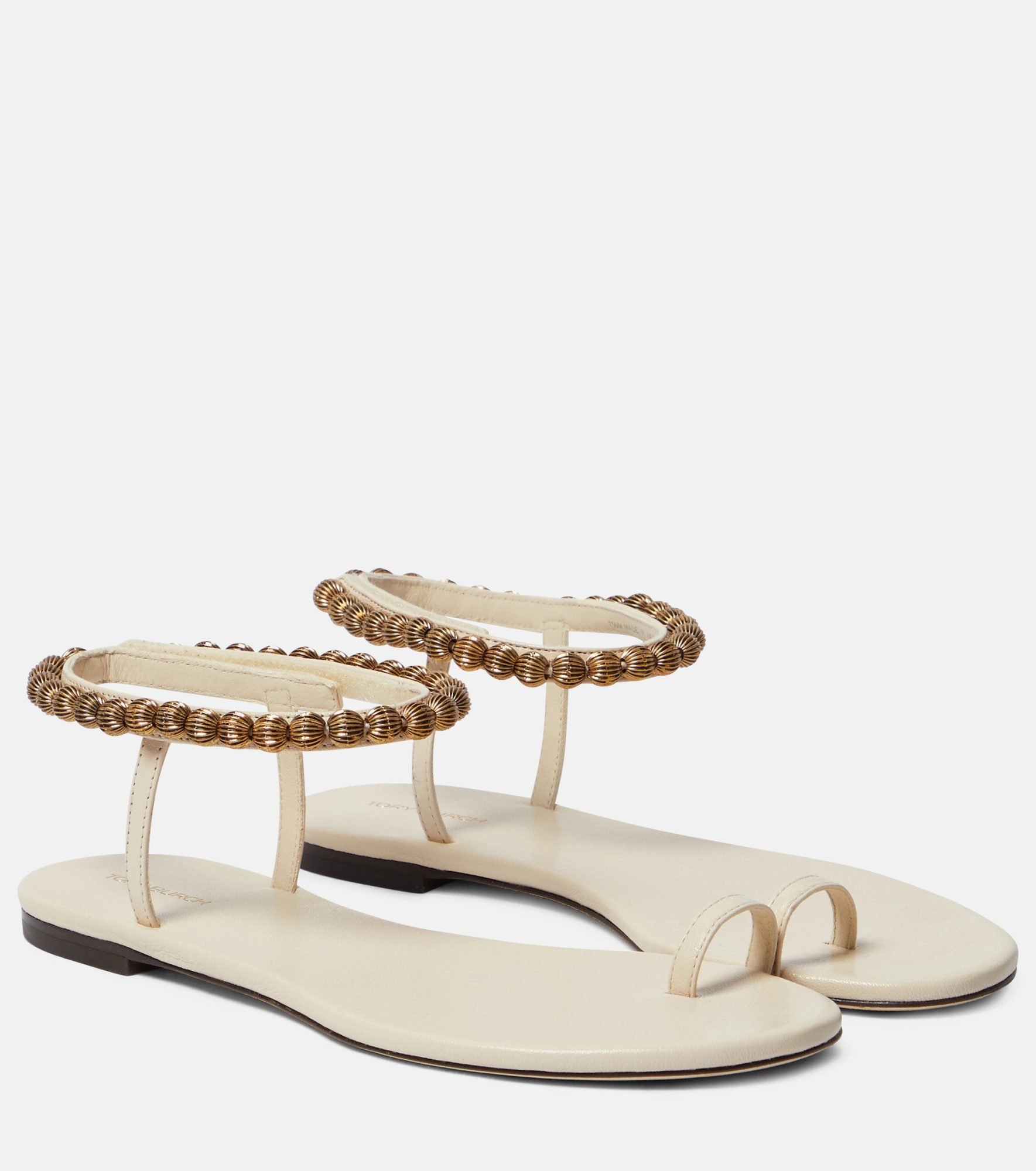 White and gold sandals by Tory Burch