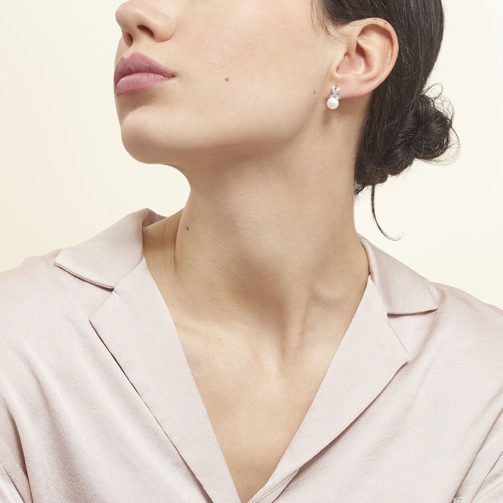 Discrete silver earrings for women