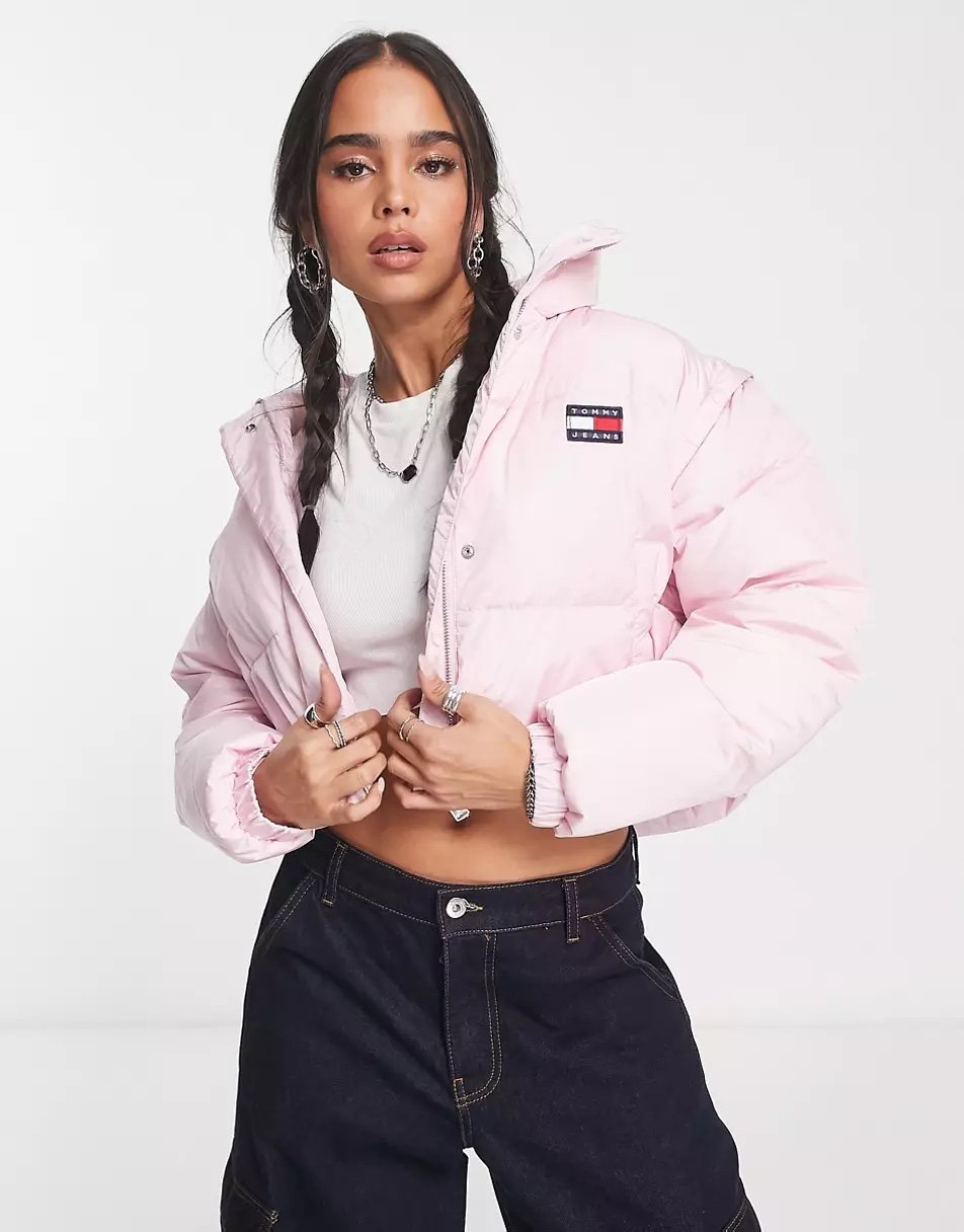 Short pink Tommy Jeans down jacket with removable sleeves
