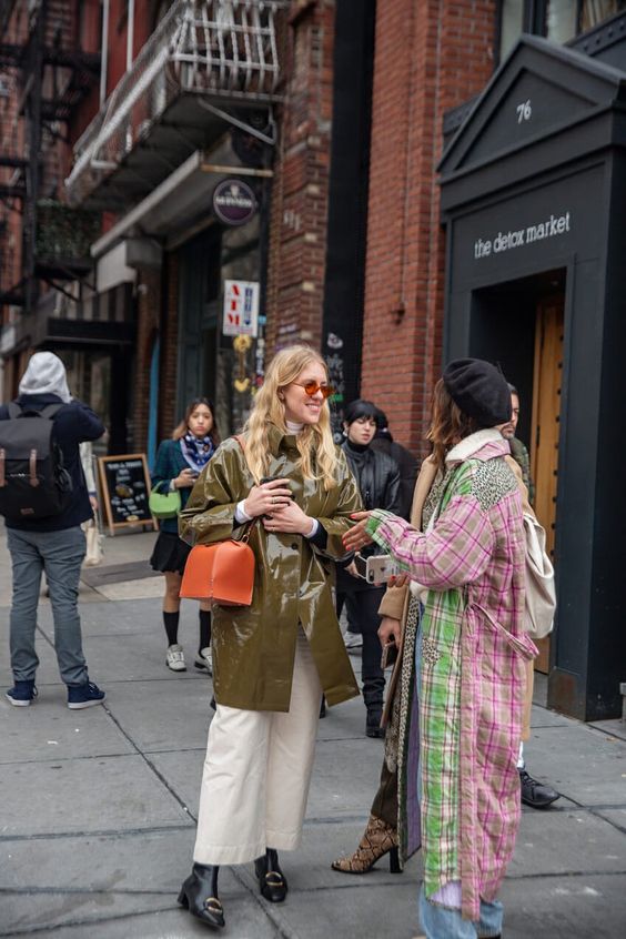 Khaki raincoat with white pants