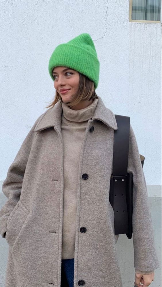 Beige coat and green beanie