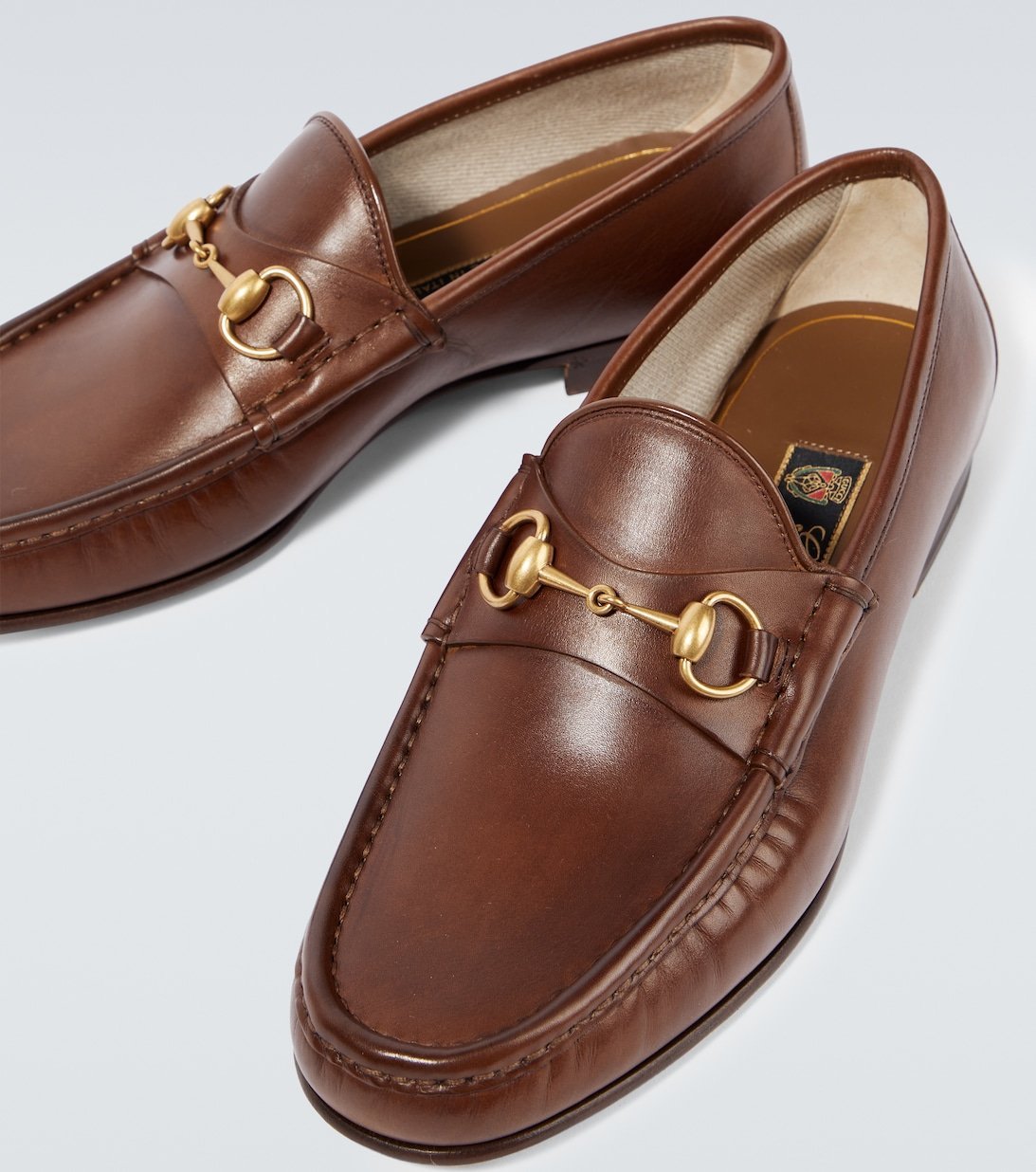 Pair of brown Horsebit loafers for men by Gucci