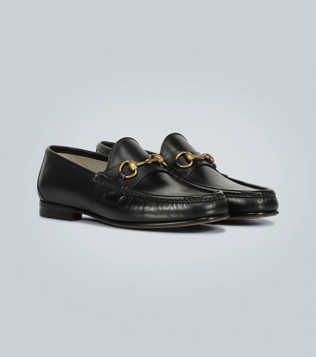 Pair of black Horsebit loafers for men by Gucci