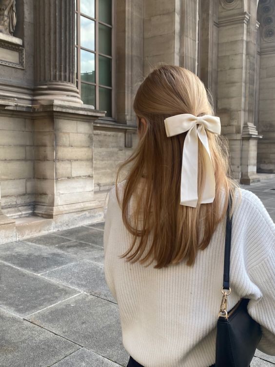 Elegant bow with fabric tails