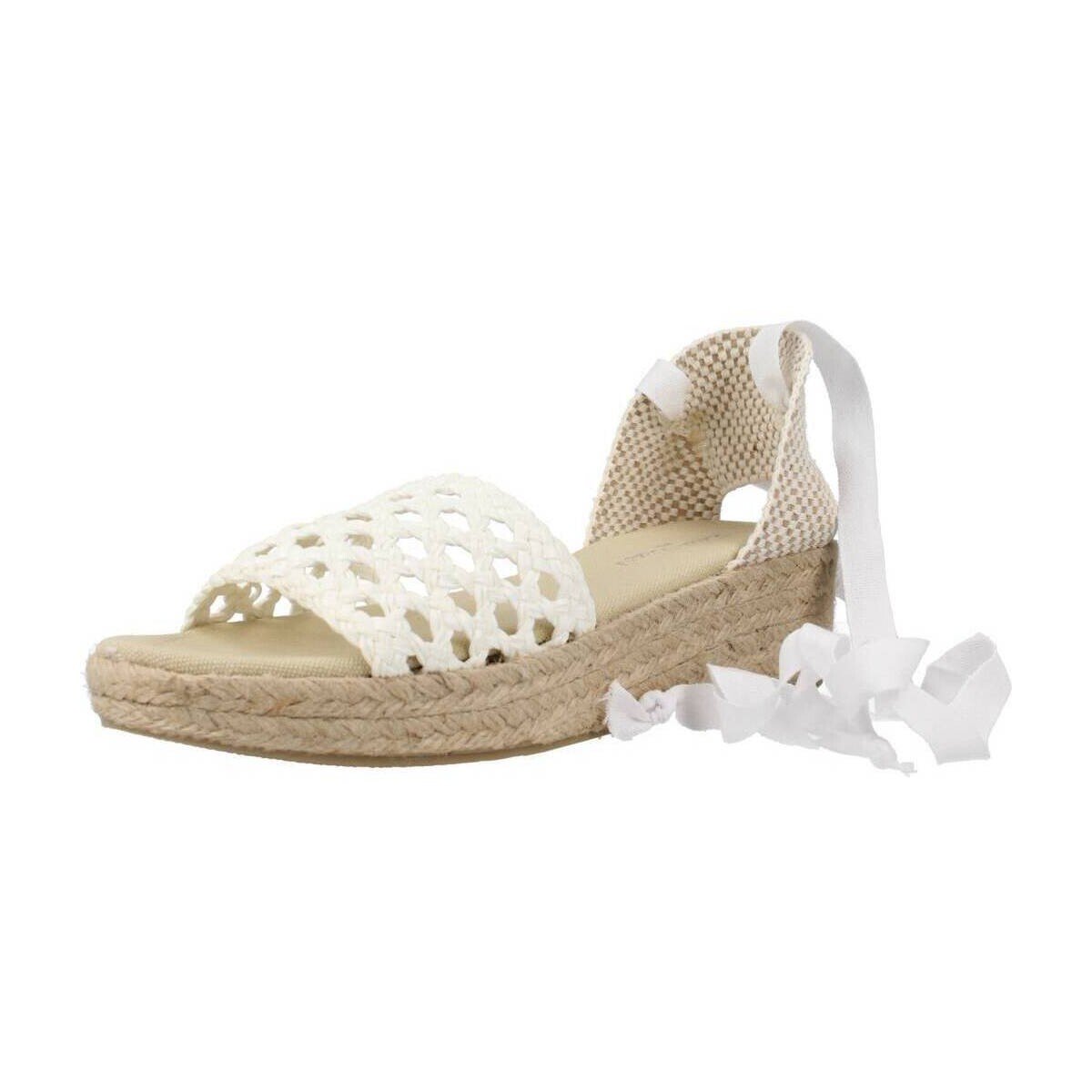 Open laced white espadrilles from Clara Duran