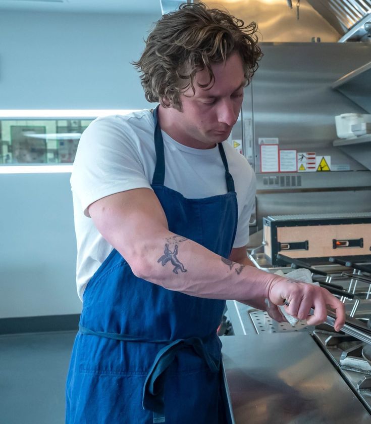 Carmy The Bear outfit apron and white t-shirt