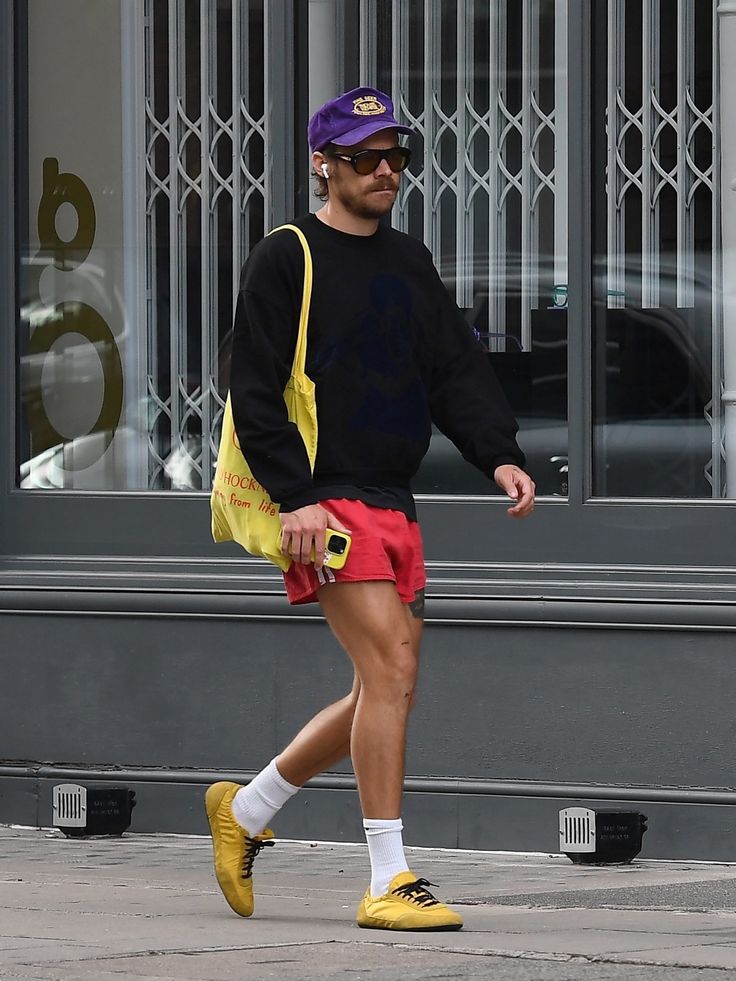 Harry Styles wearing Prada Collapse Re-Nylon soft sneakers trend Modalova