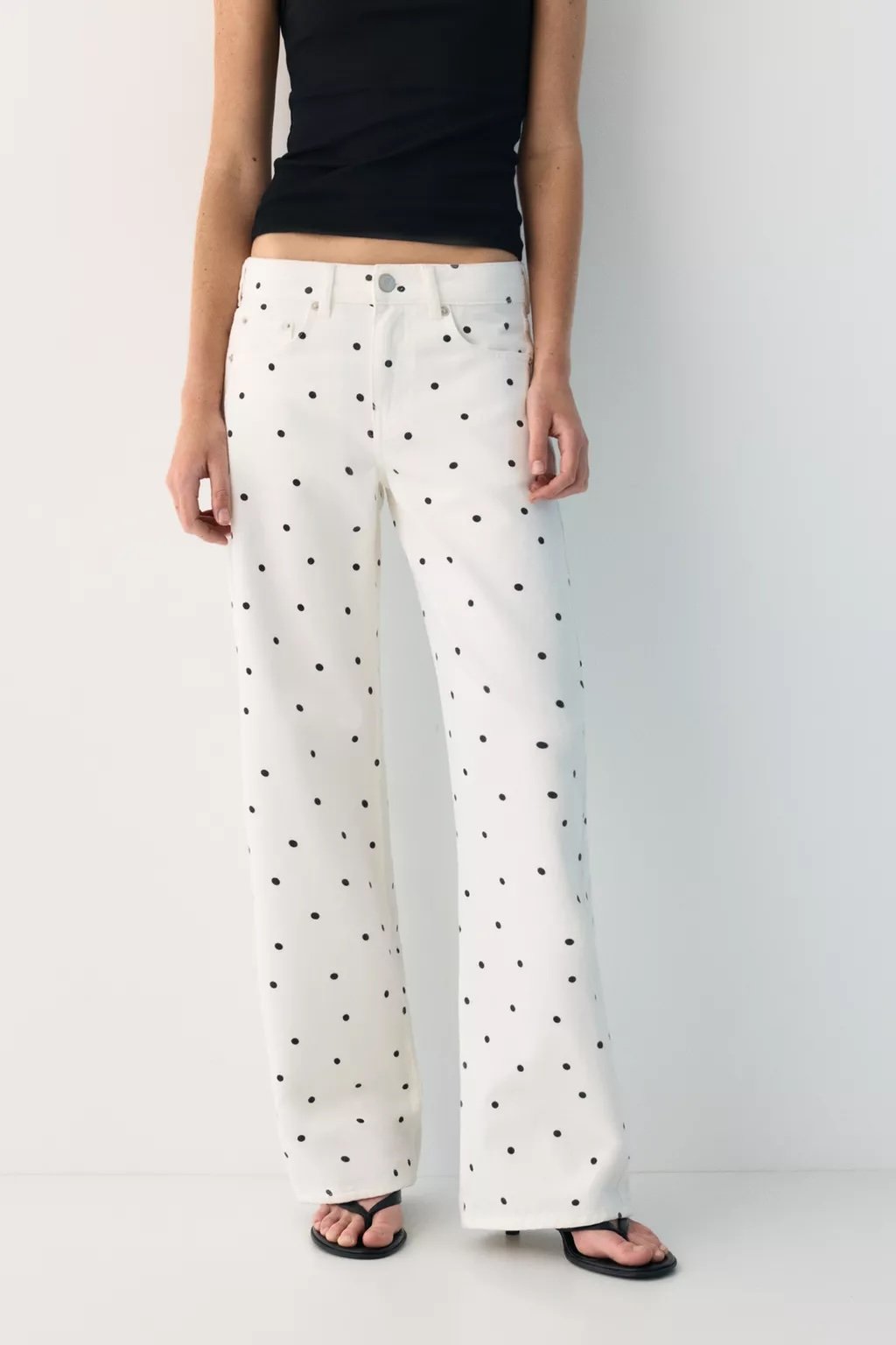 The polka dot print is back like never before! 27 White pants with black dots by Pull & Bear