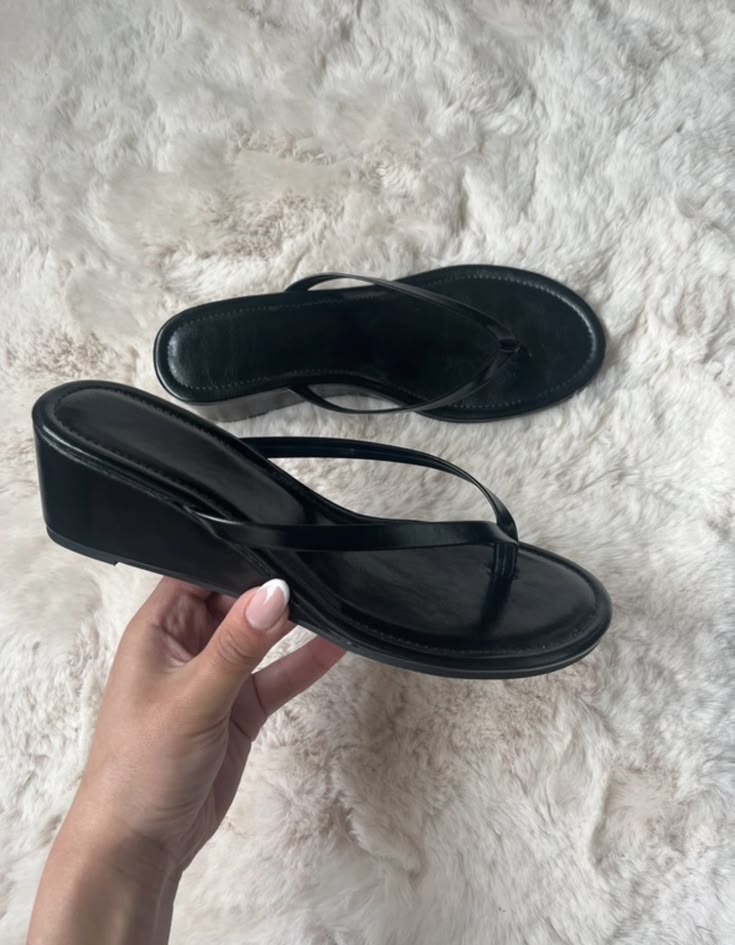 Black leather wedge flip-flops