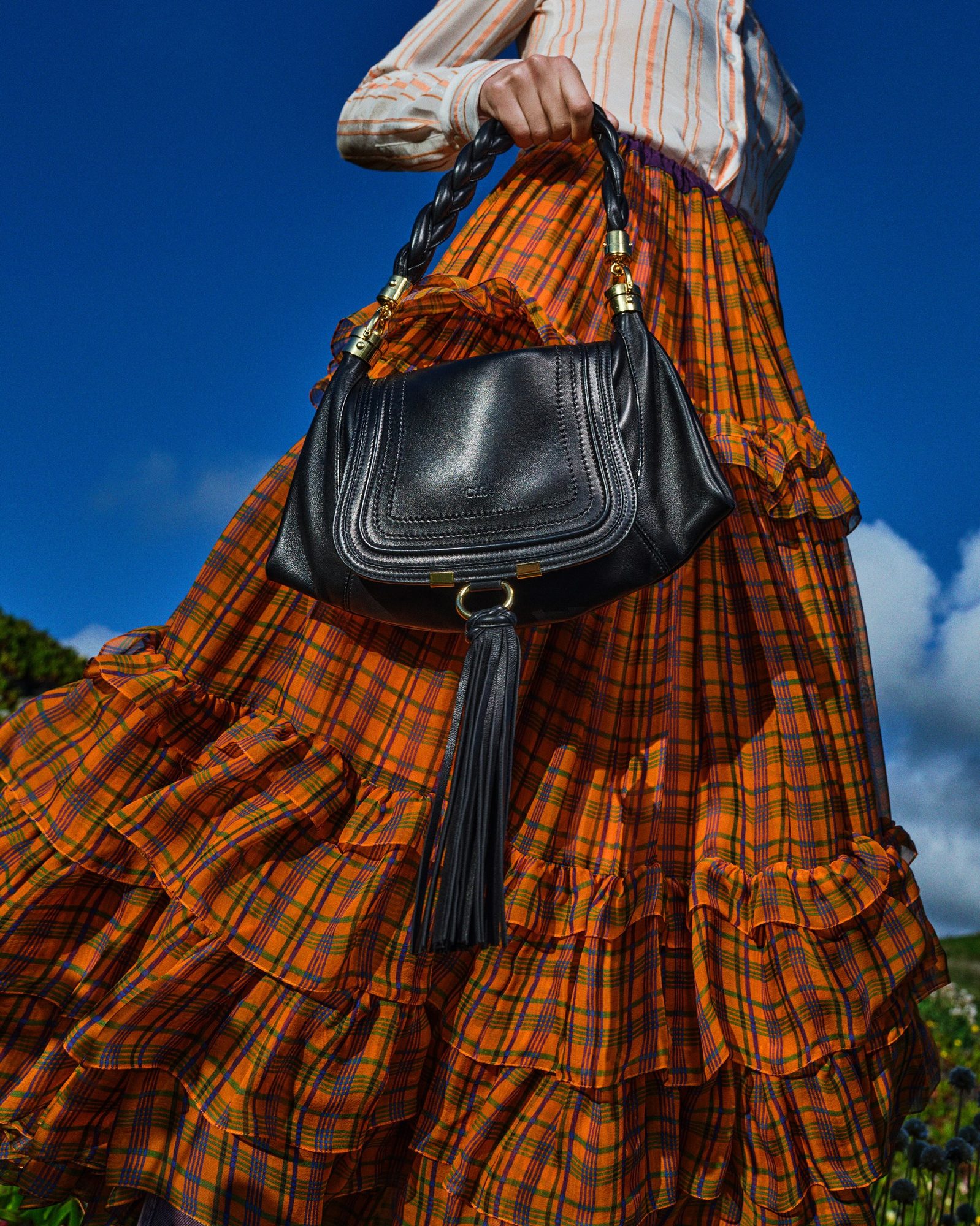 Tartan and Argyle as Signature Patterns This Autumn 3 Chloé FW26 long tartan skirt